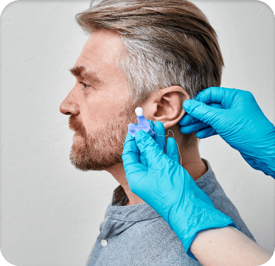 Man getting custom hearing protection made from his local hearing clinic